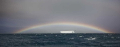 Picture of ANTARCTICA, A TABULAR ICEBERG UNDER A LOW RAINBOW