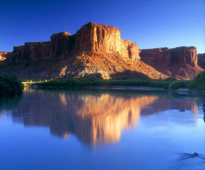 Picture of UT, A MESA REFLECTING IN THE COLORADO RIVER