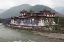 Picture of BHUTAN PUNAKHA DZONG PALACE WITH JACARANDA