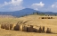 Picture of ITALY, SAN QUIRICO DORCIA BALES OF HAY AND FARM