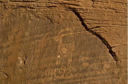 Picture of UTAH, MONUMENT VALLEY PETROGLYPHS ON STONE WALL