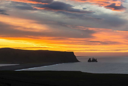 Picture of ICELAND, DYRHOLAEY SUNRISE OVER OCEAN AND LAND