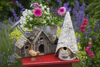 Picture of BIRD HOUSES AND PLANTER ON GARDEN TABLE