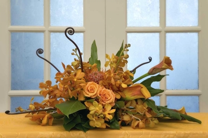Picture of FLOWER ARRANGEMENT ON TABLE IN FRONT OF DOOR