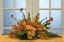 Picture of FLOWER ARRANGEMENT ON TABLE IN FRONT OF DOOR