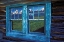 Picture of WY, GRAND TETONS REFLECTING IN WINDOWS AT SUNRISE