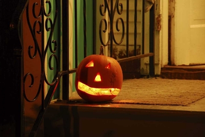Picture of OR, PORTLAND LIGHTED JACK-O-LANTERN ON PORCH