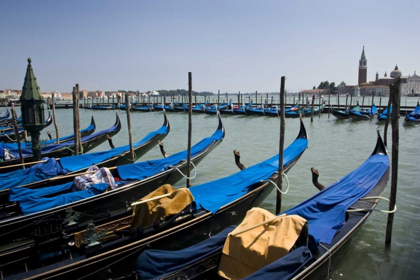 Picture of ITALY, VENICE A ROW OF GONDOLAS DOCKED