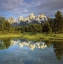 Picture of WY, GRAND TETONS REFLECTING IN THE SNAKE RIVER