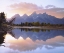 Picture of WY, GRAND TETONS REFLECTING IN THE SNAKE RIVER