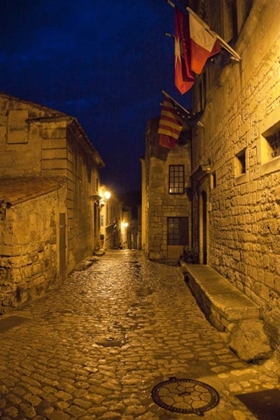 Picture of FRANCE, PROVENCE FLAGS OVER STREET IN CASTLE