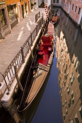 Picture of ITALY, VENICE GONDOLA PARKED IN A CANAL