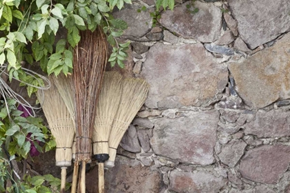 Picture of MEXICO BROOMS LEANING AGAINST STONE WALL