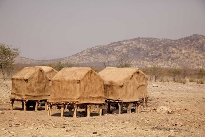 Picture of NAMIBIA, OPUWO STORAGE HUTS IN A HIMBA VILLAGE