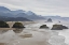 Picture of OREGON, CANNON BEACH FOG RISES OVER COASTLINE