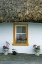 Picture of IRELAND, CO CLARE A THATCH-ROOFED COTTAGE