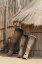 Picture of NAMIBIA, CAPRIVI STRIP TRIBAL DRUMS LEAN ON HUT