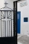 Picture of GREECE, SANTORINI BLACK IRON CHURCH GATE