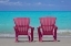 Picture of BAHAMAS, LITTLE EXUMA IS PINK CHAIRS ON BEACH