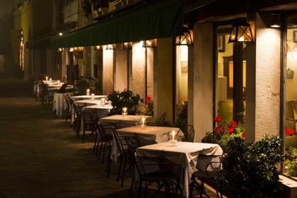 Picture of ITALY, VENICE RESTAURANT TABLES LIT AT NIGHT