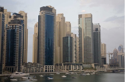 Picture of UAE, DUBAI MODERN BUILDINGS TOWER OVER BOATS
