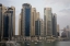 Picture of UAE, DUBAI MODERN BUILDINGS TOWER OVER BOATS