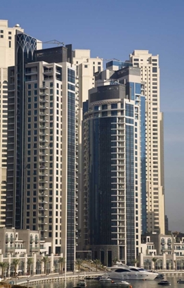 Picture of UAE, DUBAI MARINA TOWERS WITH BOATS AT ANCHOR