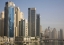 Picture of UAE, DUBAI MARINA TOWERS WITH BOATS AT ANCHOR