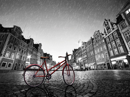 Picture of RED BIKE ON COBBLE STONE STREET