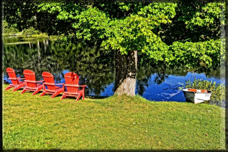 Picture of A FAMILY OF ADIRONDAKS AND A ROW BOAT 