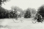 Picture of MOTORCYCLE COP CHASES A PENNY FARTHING VELOCIPEDE