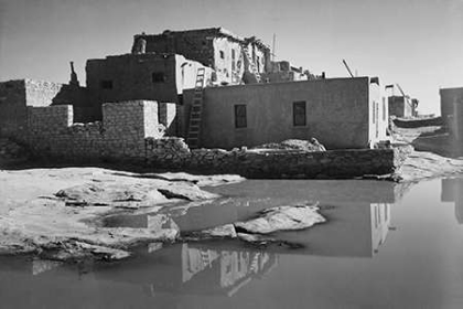 Picture of ADOBE HOUSE WITH WATER IN FOREGROUND - ACOMA PUEBLO, NEW MEXICO - NATIONAL PARKS AND MONUMENTS, CA. 