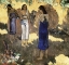 Picture of WOMEN STANDING AGAINST A YELLOW BACKGROUND FEMMES DEBOUT SUR FOND JAUNE