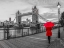 Picture of TOURIST WITH RED UMBRELLA ON PROMENADE NEAR TOWER BRIDGE, LONDON, UK