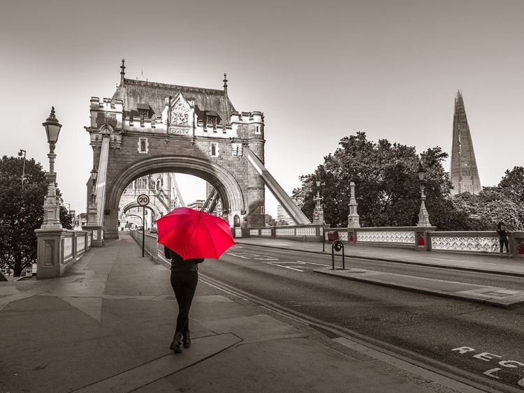 Picture of TOURIST WITH UMBRELLA ON TOWER BRIDGE, LONDON, UK