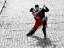 Picture of COUPLE DANCING TANGO ON COBBLESTONE ROAD