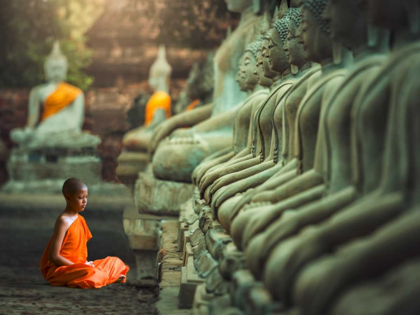 Picture of YOUNG BUDDHIST MONK PRAYING, THAILAND
