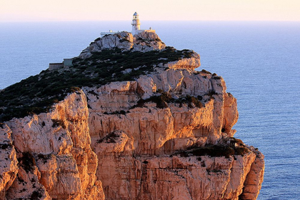 Picture of PEACEFUL LIGHTHOUSE ON THE CLIFF AT SUNSET