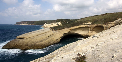 Picture of FLAT ROCKS WITH NATURAL ARCH ON THE COAST OF SARDINIA ISLAND
