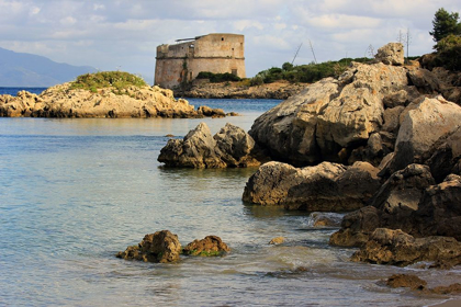 Picture of SARACEN TOWER ON CRYSTALLINE SEA WITH ROCKS