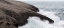 Picture of WAVES CRASHING ON SMOOTH ROCKS CROP