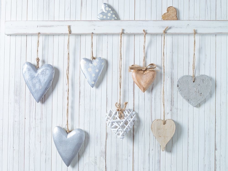 Picture of HEARTS HANGING ON WOODEN BACKGROUND