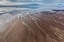 Picture of AFRICA-TANZANIA-AERIAL VIEW OF STREAMS WINDING ALONG SHORE AND DISTANT OL DOINYO LENGAI VOLCANO