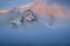 Picture of ANTARCTICA-SOUTH GEORGIA ISLAND-STROMNESS BAY CLOUD-COVERED MOUNTAIN AT SUNSET 
