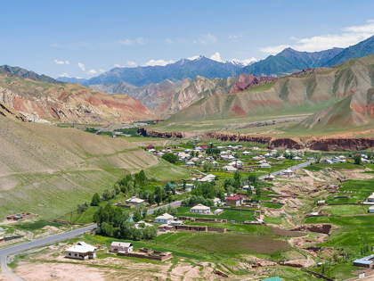Picture of VILLAGE AT THE PAMIR HIGHWAY THE MOUNTAIN RANGE TIAN SHAN OR HEAVENLY MOUNTAINS 