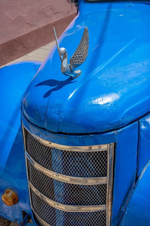 Picture of DETAIL OF CLASSIC BLUE AMERICAN CAR WITH CHROME SWAN HOOD ORNAMENT IN TRINIDAD-CUBA