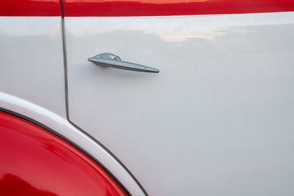 Picture of DETAIL OF DOOR ON RED AND WHITE CLASSIC AMERICAN FORD IN HABANA-HAVANA-CUBA