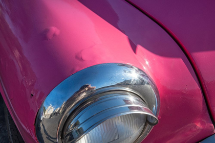 Picture of DETAIL OF CHROME HEAD LIGHT ON HOT PINK CLASSIC AMERICAN OLDSMOBILE-HAVANA-CUBA