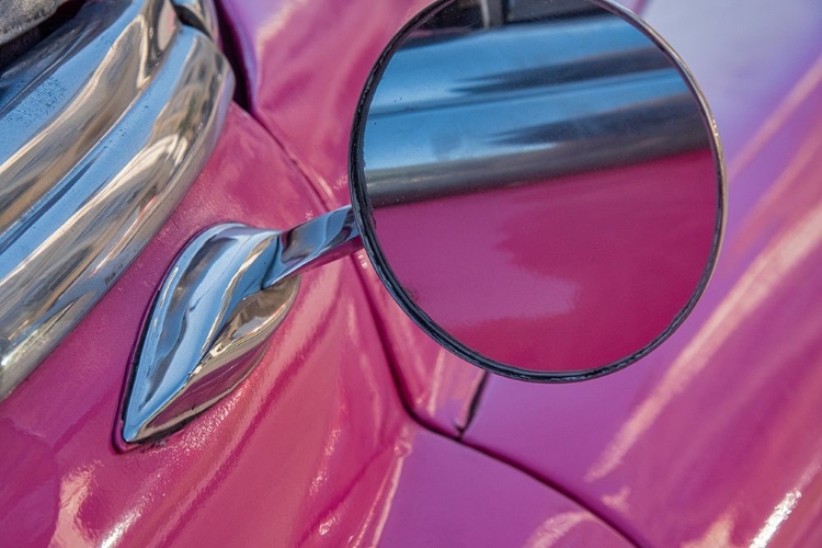 Picture of CLOSE-UP SIDE MIRROR ON HOT PINK CLASSIC AMERICAN OLDSMOBILE IN VIEJA-OLD HABANA-HAVANA-CUBA