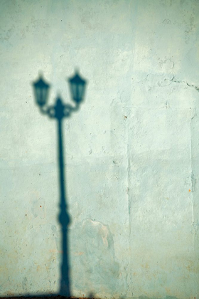 Picture of MORNING SHADOW OF A LAMPPOST ON LIGHT BLUE-GREEN HOUSE WALL IN TRINIDAD-CUBA